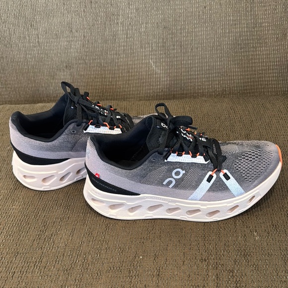 On Running Athletic Shoes in Black, Gray, and White - Picture 1 of 4